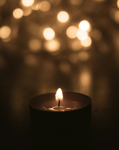 A lit candle A lit candle